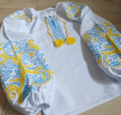 Дитяча вишита блуза Ольга на домотканому полотні з жовто-бакитною вишивкою
